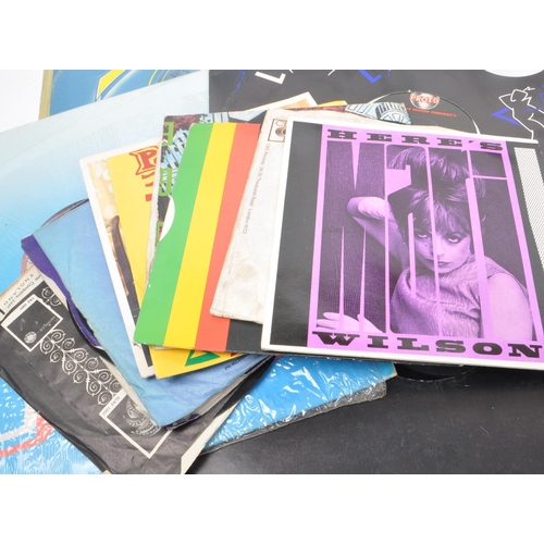 435 - A collection of 20th century LP and 45 rpm vinyl records. The collection to include examples from Ch... 