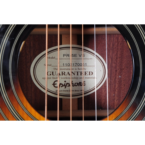 437 - Late 20th century Epiphone acousitc guitar with sunburst design and mother of pearl inlay on the hea... 