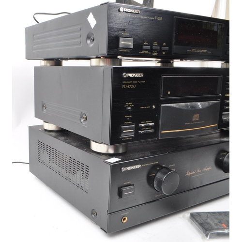 439 - Pioneer - Three vintage 1990 Hi-Fi audio systems, comprising of: an A-400 integrated stereo amplifie... 