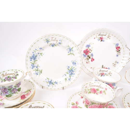 44 - Royal Albert - A collection of vintage 1950s bone china 'Flower of The Month Series' tea service pie... 