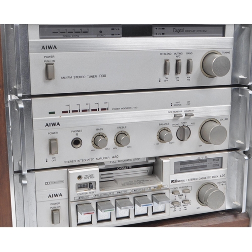 442 - AIWA - A vintage late 20th century Hi-Fi audio visual stacking system, including an AM / FM stereo t... 