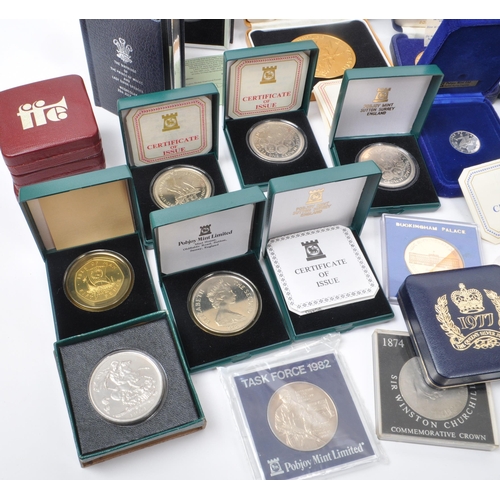 487 - A large collection of 20th century British and Crown Dependencies proof coins and medals. The collec... 