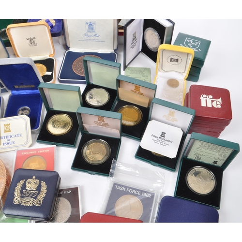 487 - A large collection of 20th century British and Crown Dependencies proof coins and medals. The collec... 