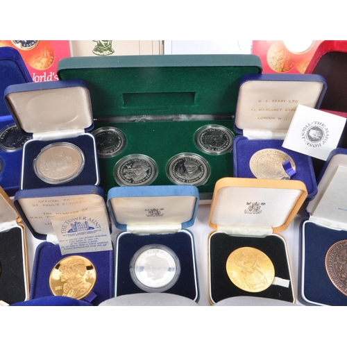 487 - A large collection of 20th century British and Crown Dependencies proof coins and medals. The collec... 