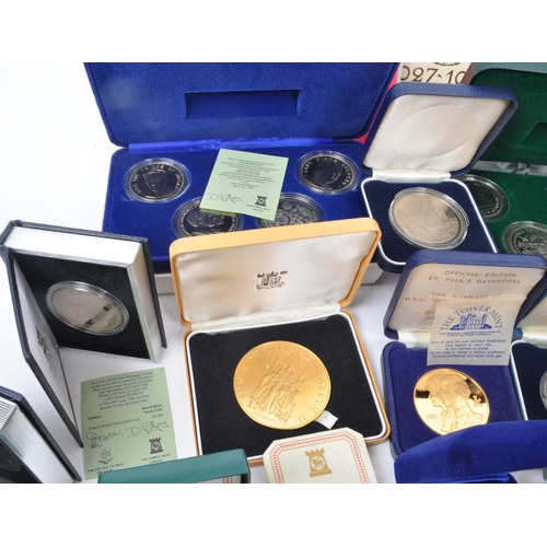 487 - A large collection of 20th century British and Crown Dependencies proof coins and medals. The collec... 