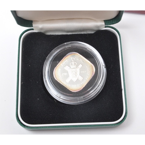 490 - A collection of British & Foreign silver proof commemorative coins. The collection to include tw... 