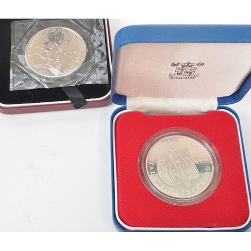 490 - A collection of British & Foreign silver proof commemorative coins. The collection to include tw... 