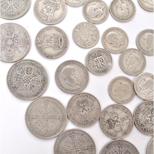 499 - A collection of early 20th century British .500 silver circulated currency coins. The collection to ... 