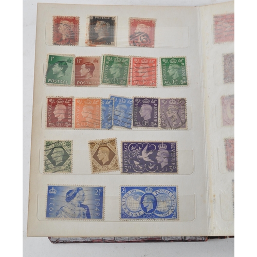 509 - A small album of 19th and 20th century British postage stamps. The collection to include a early red... 