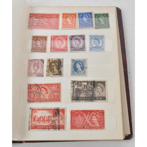 509 - A small album of 19th and 20th century British postage stamps. The collection to include a early red... 