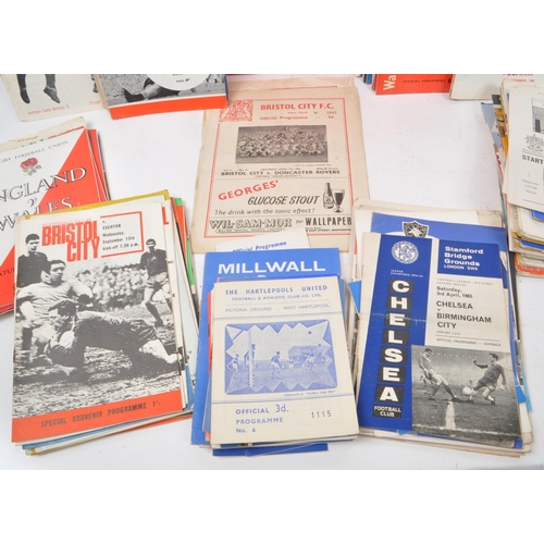 534 - A large collection of vintage 1960s and 1950s football programmes, as well as some Rugby examples as... 