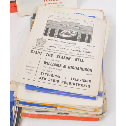 534 - A large collection of vintage 1960s and 1950s football programmes, as well as some Rugby examples as... 