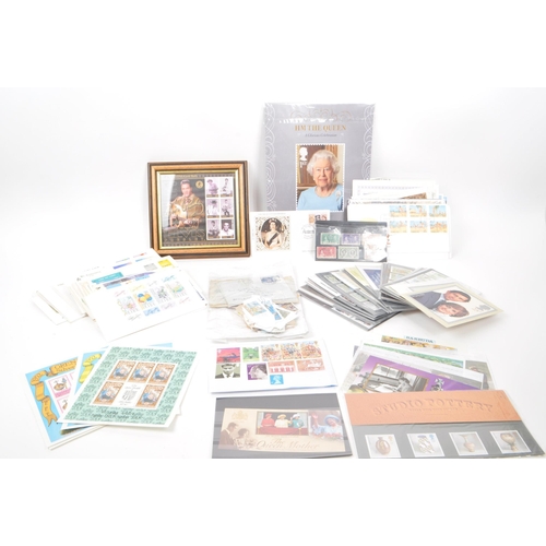 539 - A large collection of 20th century kiloware postage stamps, first day covers, presentation packs, an... 