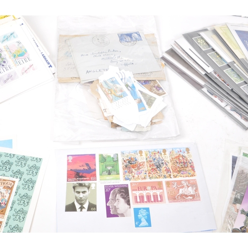 539 - A large collection of 20th century kiloware postage stamps, first day covers, presentation packs, an... 