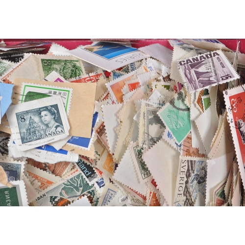 545 - A collection of 20th century British and Foreign kiloware loose postage stamps. The collection featu... 