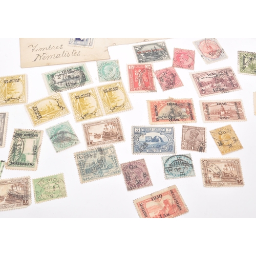 549 - A collection of 19th and early 20th century Iranian, Iraqi, Turkiye, and Indian postage stamps. The ... 