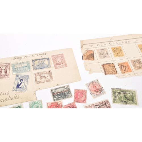 549 - A collection of 19th and early 20th century Iranian, Iraqi, Turkiye, and Indian postage stamps. The ... 