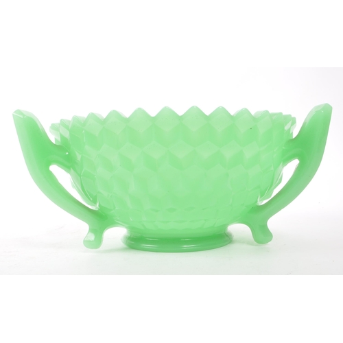 56 - An Art Deco early 20th cenury 1930s American Fostoria glass centrepiece green bowl. With a faceted e... 