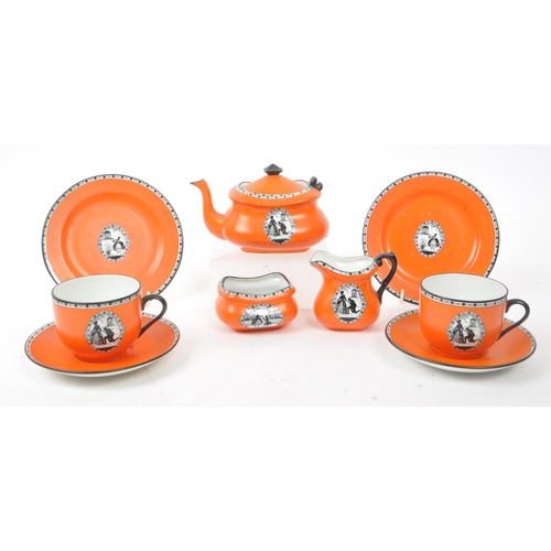 58 - Carlton Ware - A collection of early 20th-century porcelain tea service pieces, including a teapot, ... 