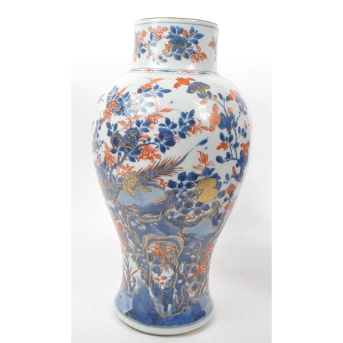 59 - A pair of tall 19th century Chinese glazed vases (1 AF). Traditional blue and red flora and fauna de... 