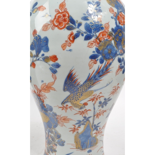 59 - A pair of tall 19th century Chinese glazed vases (1 AF). Traditional blue and red flora and fauna de... 