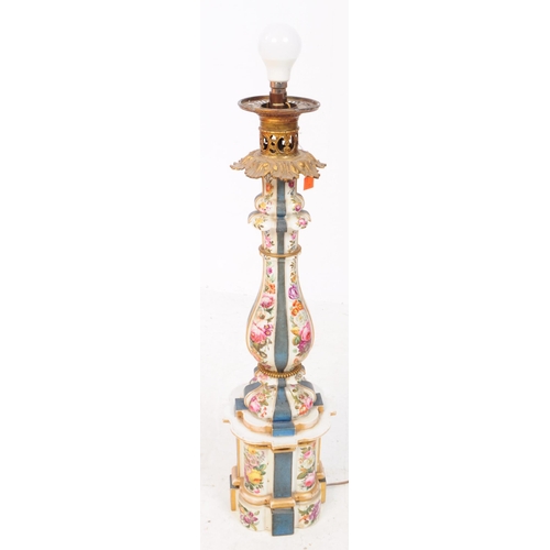 60 - A tall porcelain table lamp with ornate metal head and pale pink lampshade. The porcelain body is de... 