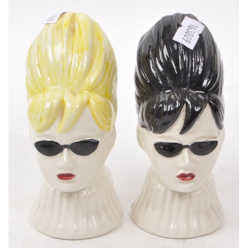 62 - Swineside - Two late 20th century kitsch style ceramic salt and pepper shakers, in the form of two w... 