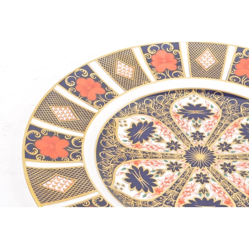 64 - Royal Crown Derby - Contemporary English bone chine porcelain Imari plate. Having a gilt blue red gr... 