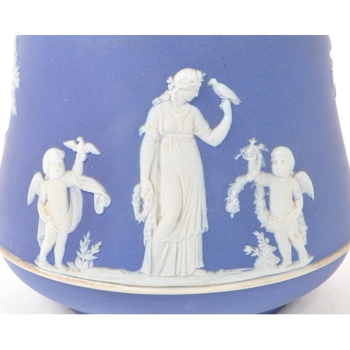 68 - Wedgwood - Jasperware - An early 20th century silver plate biscuit barrel. With shaped finial to top... 