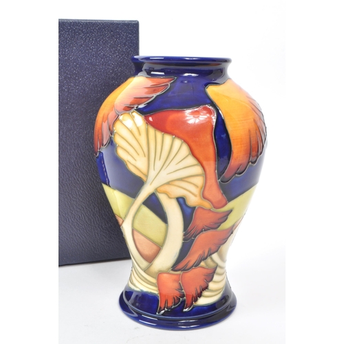 72 - Moorcroft - A modern ceramic vase designed by Kerry Goodwin in the Parasol dance design, 2005, signa... 