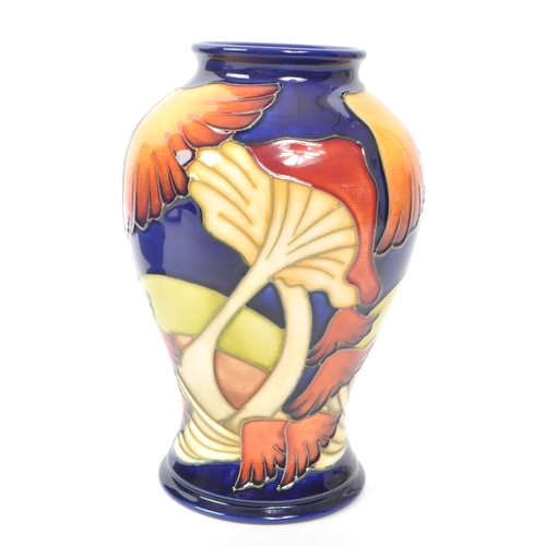 72 - Moorcroft - A modern ceramic vase designed by Kerry Goodwin in the Parasol dance design, 2005, signa... 