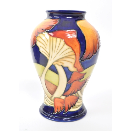 72 - Moorcroft - A modern ceramic vase designed by Kerry Goodwin in the Parasol dance design, 2005, signa... 