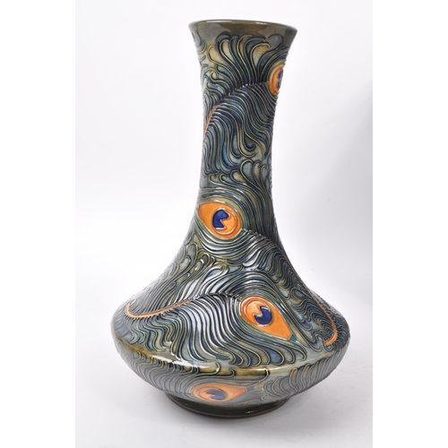 76 - Moorcroft Pottery - Late 20th century circa 1996 ceramic peacock / phoenix feather vase. Hand made i... 