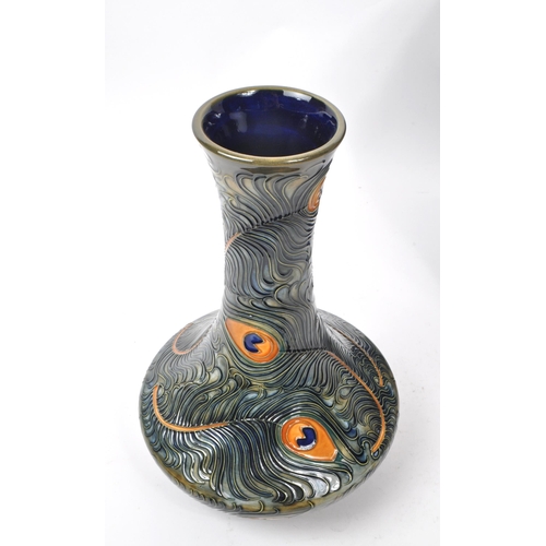 76 - Moorcroft Pottery - Late 20th century circa 1996 ceramic peacock / phoenix feather vase. Hand made i... 