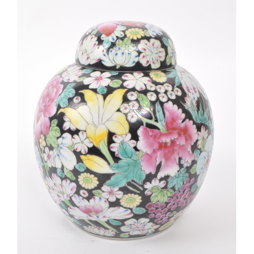 77 - An early 20th century Nianqian Zhilong ginger jar. Hand painted with floral pattern agains a black g... 