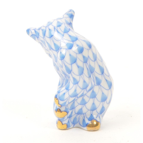 93 - Herend - A vintage 20th century Herend miniature porcelain cat figure. The figure in the form of a s... 