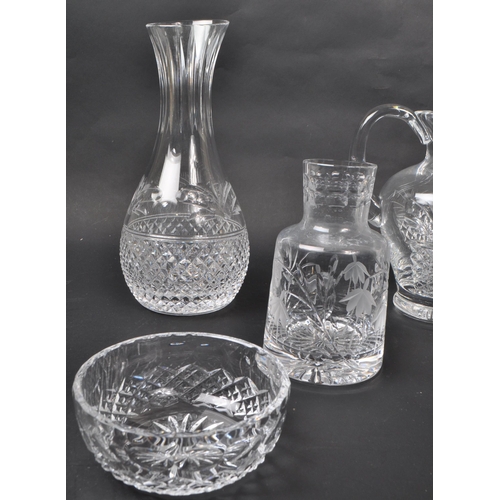 139 - A collection of eight crystal glass pieces, including a carafe, jug, two bowls, tumbler, decanter wi... 