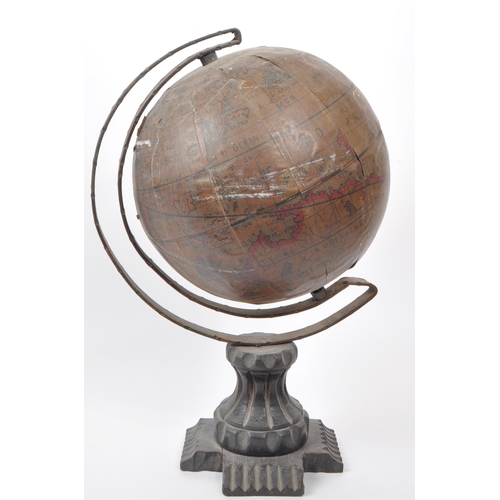 240 - A late 19th century French table top globe. The globe having a carved wooden base, with metal bent a... 