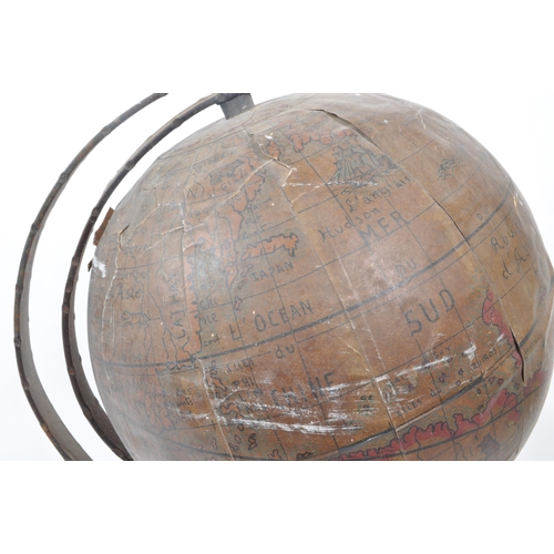 240 - A late 19th century French table top globe. The globe having a carved wooden base, with metal bent a... 