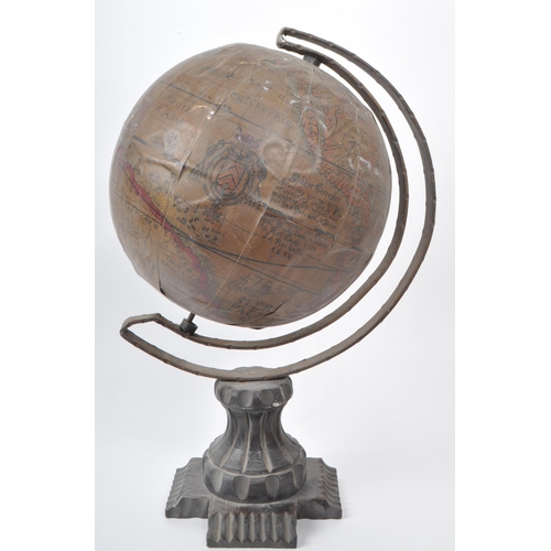 240 - A late 19th century French table top globe. The globe having a carved wooden base, with metal bent a... 