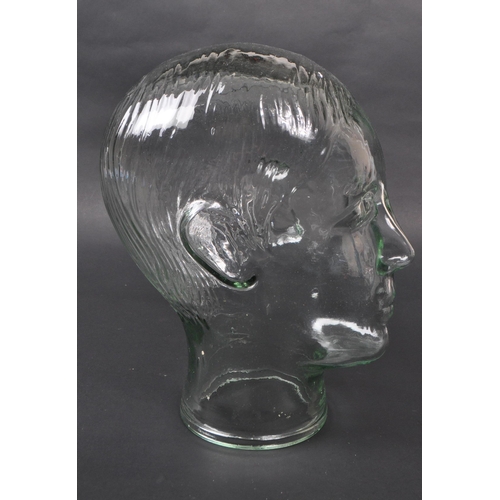 42 - A vintage 20th century pressed glass milliners / phrenology type bust head with moulded features... 