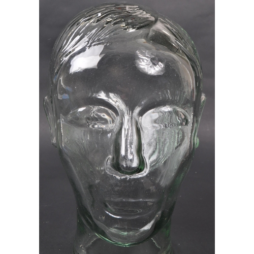 42 - A vintage 20th century pressed glass milliners / phrenology type bust head with moulded features... 