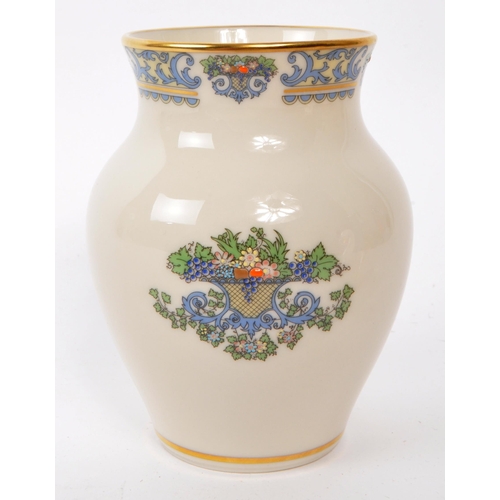 121 - Lenox - Two vintage 20th century porcelain decorative items. The collection to include a porcelain s... 