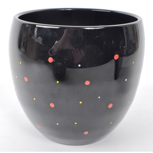 170 - Bagley - A collection of three 20th-century art deco polka dot ceramic pieces, comprising of a vase,... 