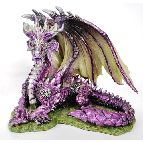 338 - A collection of six 21st century 'Nemesis Now' and 'Land of The Dragons' dragon figurines, comprisin... 