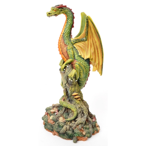 338 - A collection of six 21st century 'Nemesis Now' and 'Land of The Dragons' dragon figurines, comprisin... 