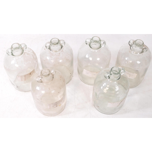 126 - A collection of six vintage 1980s Demijohn glass brewing bottles. Some with labels dating 'October 1... 