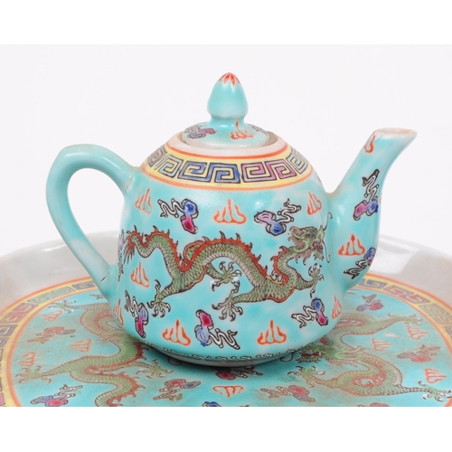 148 - An early 20th century Chinese miniature / dolls house porcelain tea / coffee set. Compirising of tea... 