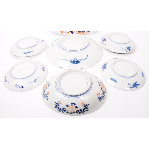 155 - A collection of late 19th century Imari style patterend dish plates and large serving platter. Featu... 