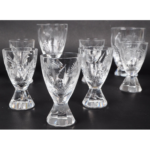 157 - Collection of mid century cut glass thistle flower design on faceted flared foot. Having eleven smal... 